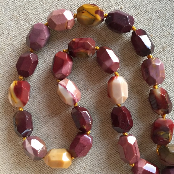 Knotted mookaite jasper necklace.